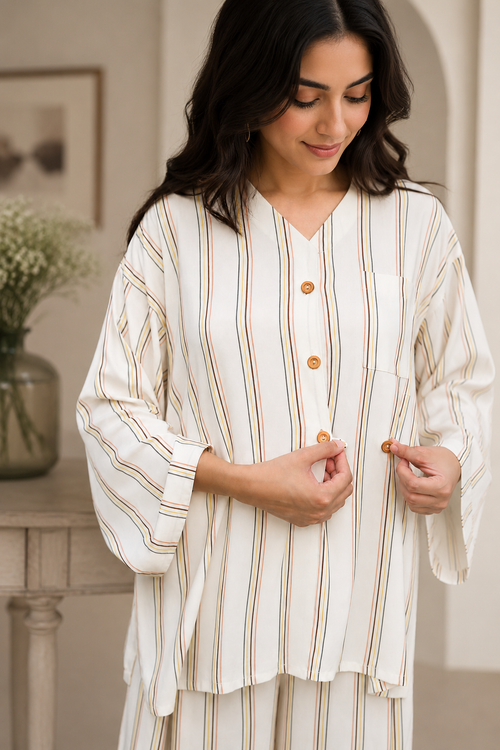 Close-up of the striped linen co-ord set chest pocket and premium stitching