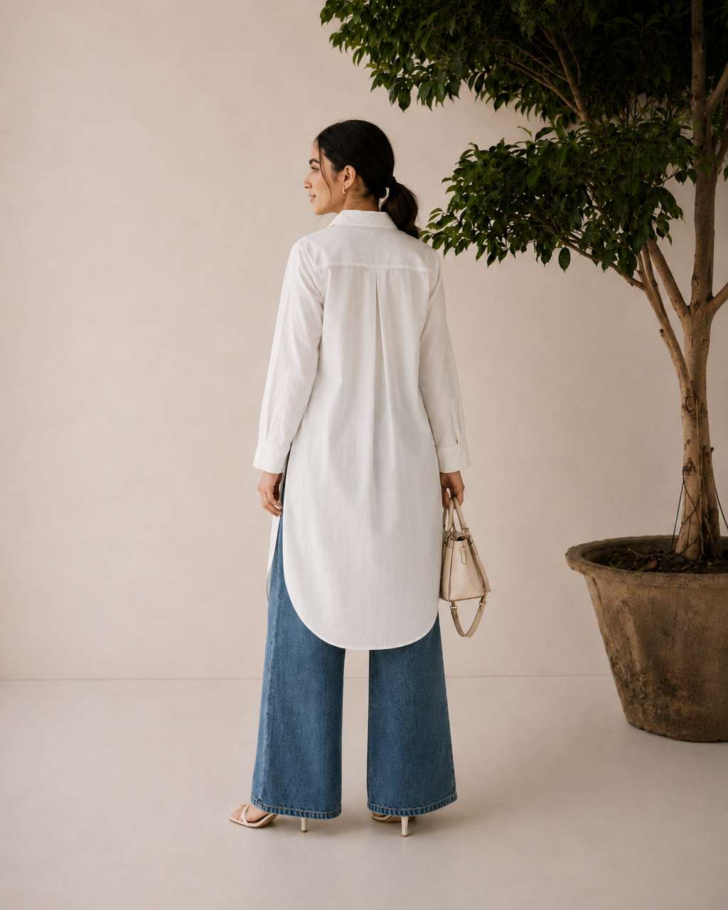 Close-up of the ivory linen shirt neckline and front placket